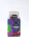 Bottle of Sea Moss & Elderberry Gummies with a purple label on a white background